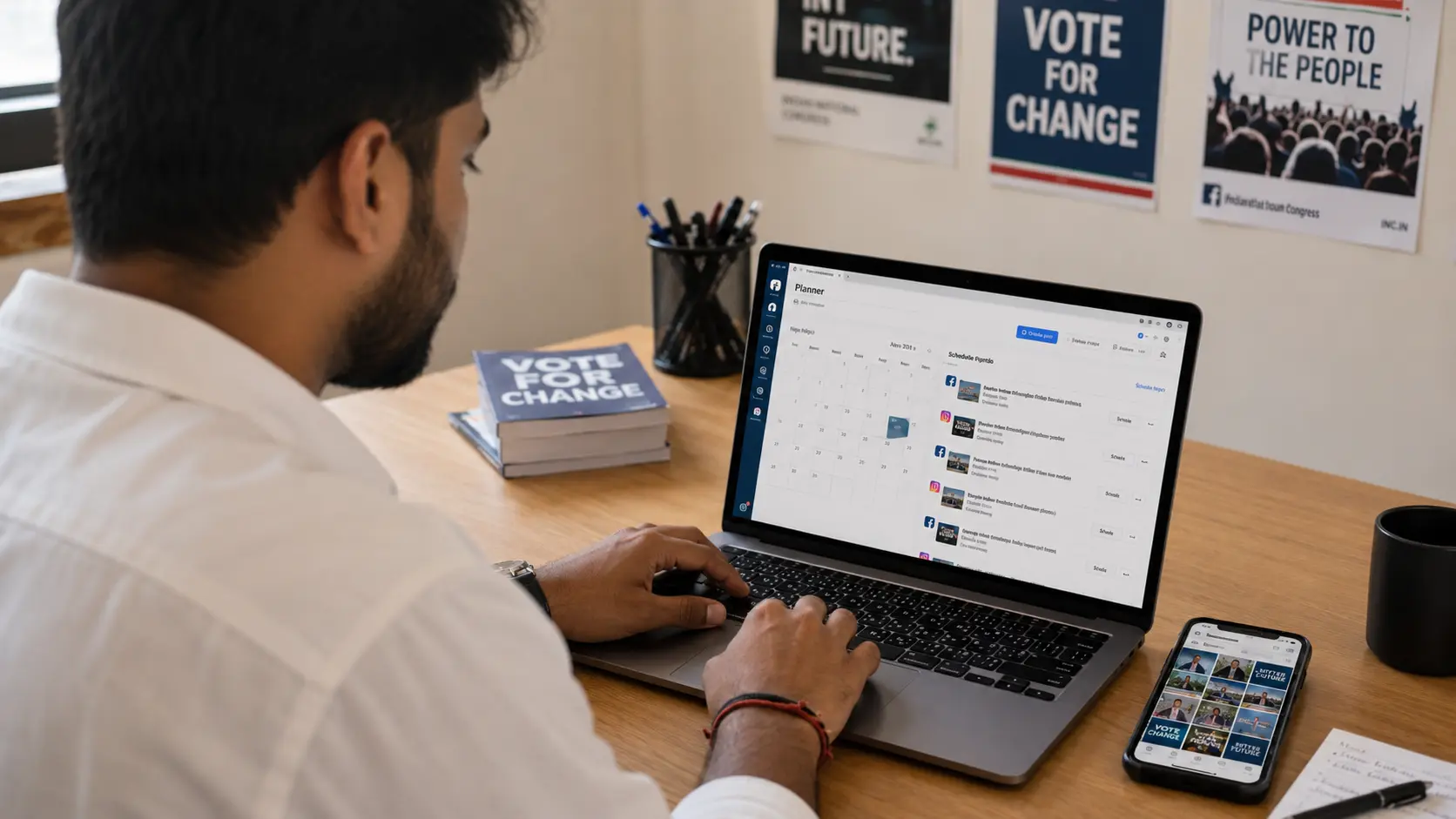 Campaign volunteer scheduling Facebook and Instagram posts on a laptop